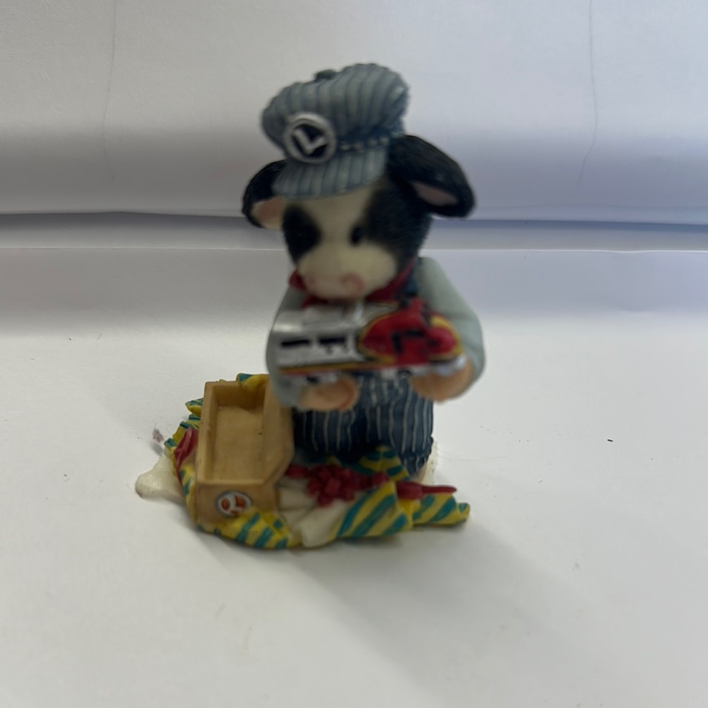 Striped Black and White Cow Figurine